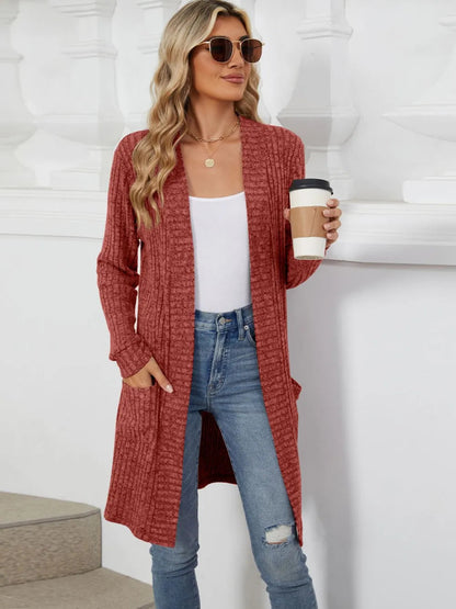 Autumn and winter long color long sleeved loose pocket cardigan jacket for women