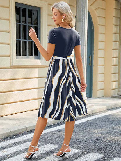 Spring and summer new round neck patchwork printed short sleeved dress with large swing